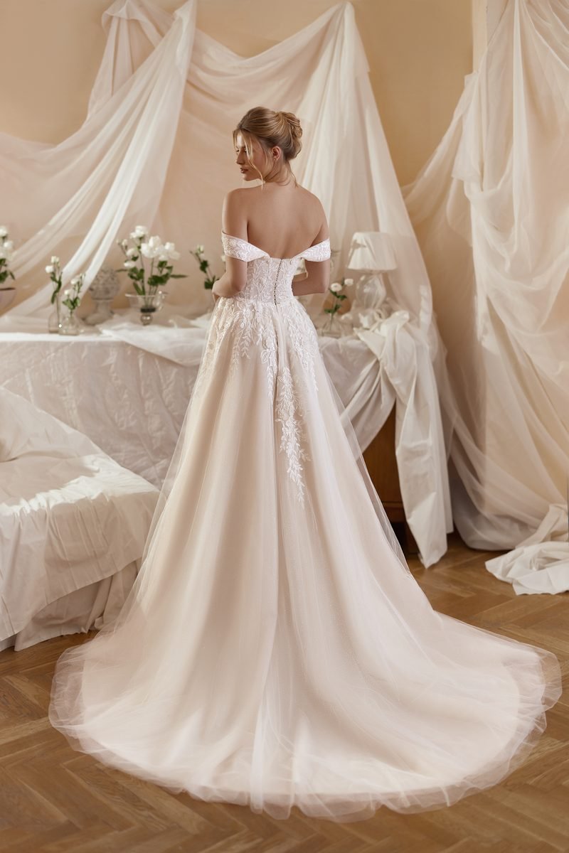 Wedding dress, a-line or ball-gown volume, off the shoulder, with a slit — the Alicia model, view 2, MADAMOON showroom, Paris 10e