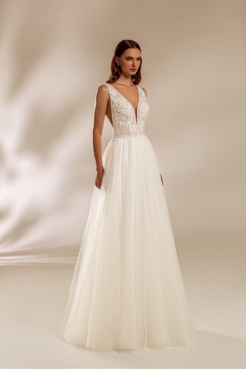Robe de mariée trapèze, perles et paillettes — modèle Angel, showroom MADAMOON Paris 10e